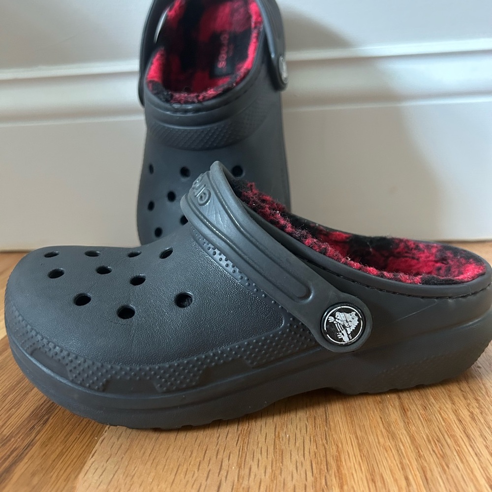 Kids Black Crocs with Red Buffalo Plaid Fleece Lining